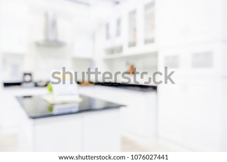 Blurred or defocused photography of modern department store. Perspective of shelf with many goods or product. Shopping business background concept.