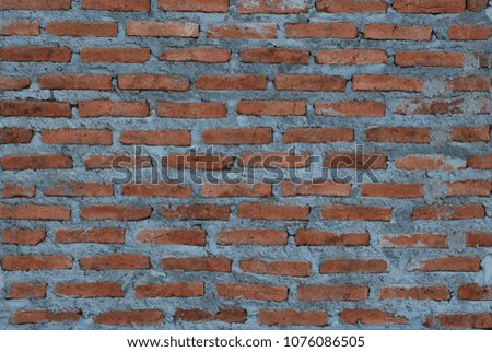 Loft style wallpaper with Red brick wall texture background