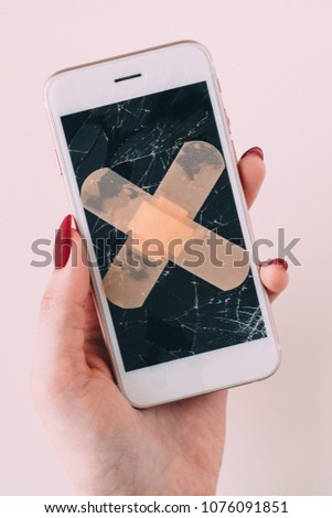 Broken screen with plaster of white smartphone. white background