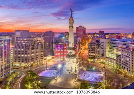 Indianapolis, Indiana, USA downtown cityscape over Monument Circle at dusk.