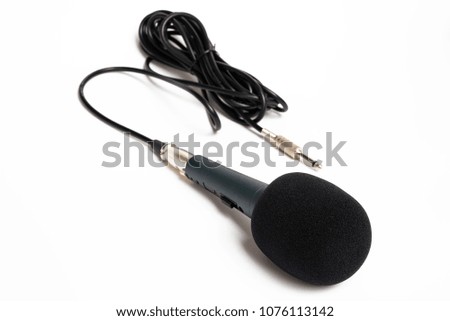 Microphone close up with cable isolated on white