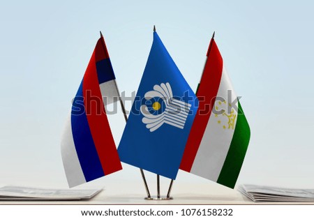 Flags of Serbian Krajina CIS and Tajikistan. Cloth of flags is 3d rendering, the rest is a photo.