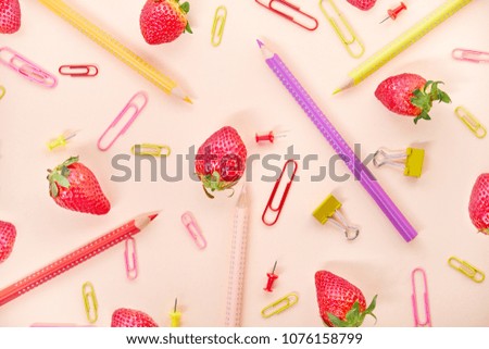 Colored pencils, School supplies, strawberry. Spring background