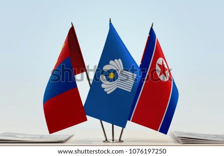 Flags of Mongolia CIS and North Korea. Cloth of flags is 3d rendering, the rest is a photo.