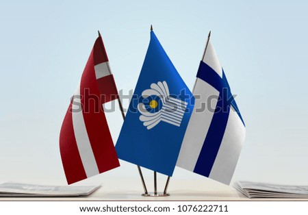 Flags of Latvia CIS and Finland. Cloth of flags is 3d rendering, the rest is a photo.
