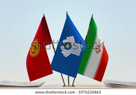 Flags of Kyrgyzstan CIS and Iran. Cloth of flags is 3d rendering, the rest is a photo.