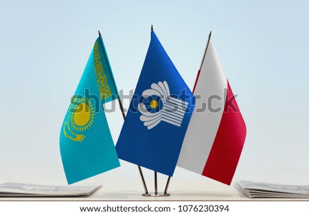 Flags of Kazakhstan CIS and Poland. Cloth of flags is 3d rendering, the rest is a photo.