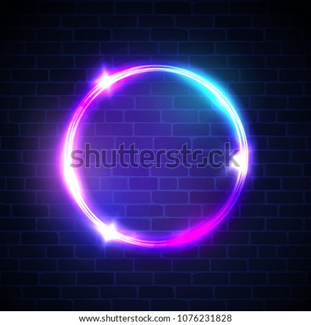 Glowing circle with neon lights on dark brick wall background. 3d neon light advertising tube banner with blank space for text. Night club electric sign. Round bright frame. Color illustration.