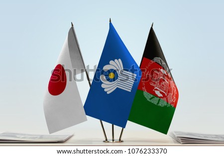 Flags of Japan CIS and Afghanistan. Cloth of flags is 3d rendering, the rest is a photo.