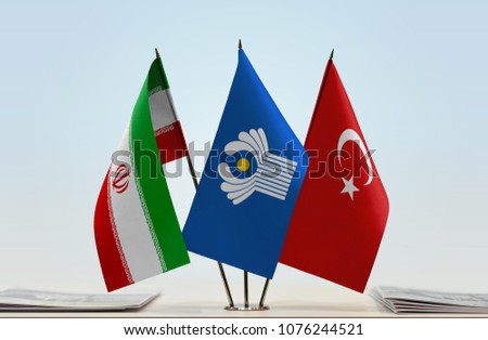Flags of Iran CIS and Turkey. Cloth of flags is 3d rendering, the rest is a photo.