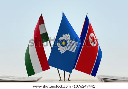 Flags of Hungary CIS and North Korea. Cloth of flags is 3d rendering, the rest is a photo.