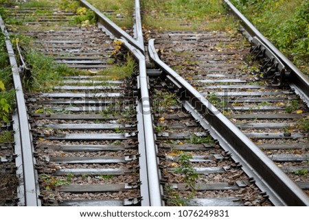 Railway junction, railway tracks, intersecting railway tracks.