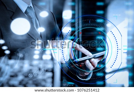 Concept of focus on target with digital diagram.double exposure of businessman shows modern technology as concept

