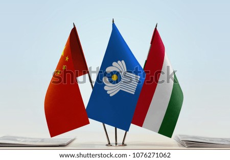Flags of China CIS and Hungary. Cloth of flags is 3d rendering, the rest is a photo.