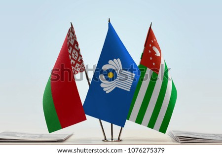 Flags of Belarus CIS and Abkhazia. Cloth of flags is 3d rendering, the rest is a photo.