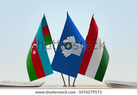 Flags of Azerbaijan CIS and Hungary. Cloth of flags is 3d rendering, the rest is a photo.
