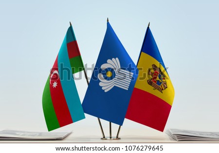 Flags of Azerbaijan CIS and Moldova. Cloth of flags is 3d rendering, the rest is a photo.