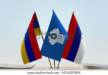 Flags of Armenia CIS and Serbian Krajina. Cloth of flags is 3d rendering, the rest is a photo.