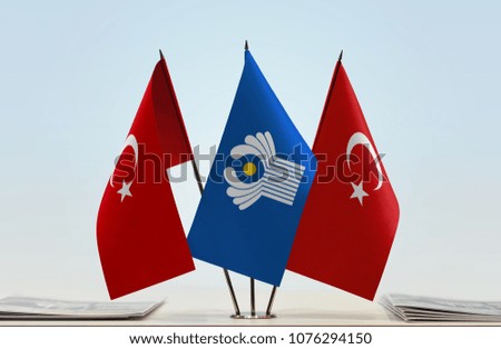 Two flags of Turkey and CIS flag between