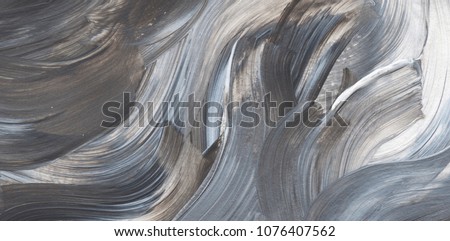 Creative grey abstract hand painted background, wallpaper, texture, close-up fragment of acrylic painting on canvas with brush strokes. Modern art. Contemporary art.