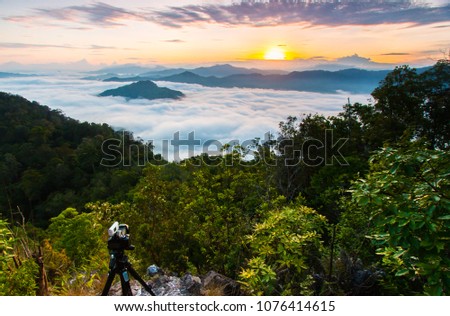 Panoramic view misty morning sunrise in mountain at southern Thailand