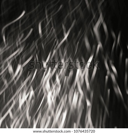 Black and white lighting motion blur. Fun Camera trick. Party Scene, Rush of energies. Monotone