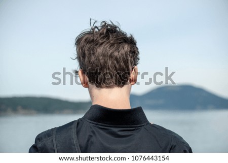 A Young Man On The Ferry