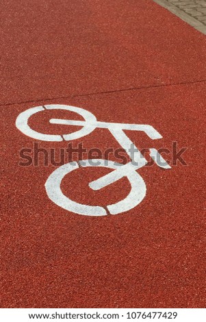 Bicycle lane colored in red