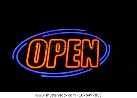 Vintage Neon Open Sign at Night