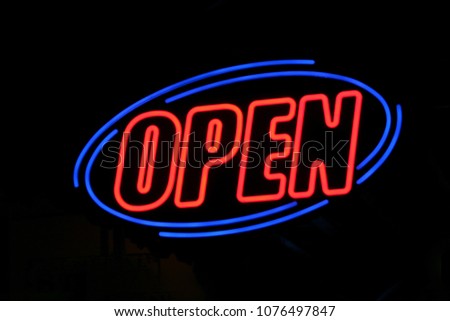 Vintage Neon Open Sign at Night