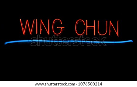 Neon Wing Chun Sign on Black Background