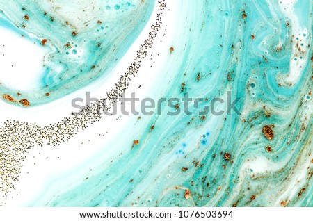 Liquid marble pattern with bronze powder. Style incorporates the swirls of marble or the ripples of agate. Marbleized effect. Natural Luxury. Ancient oriental drawing technique. Fluid art.
