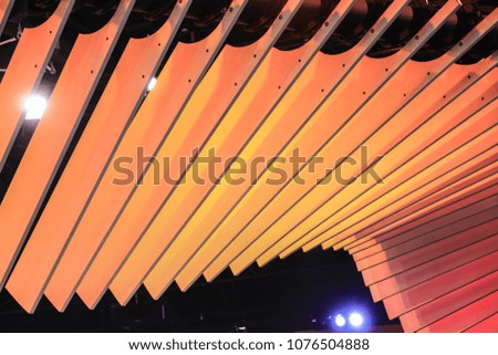 Orange sheeting on the ceiling,Ceiling modern design pattern decoration in the building,Challenger Impact, Muang Thong Thani Thailand.