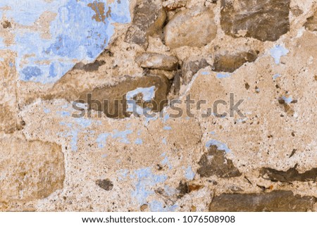 shabby surface of ancient wall of natural stone