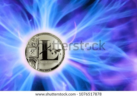 birth or fork of Litecoin cryptocurrency. coin ltc background real cold plasma.