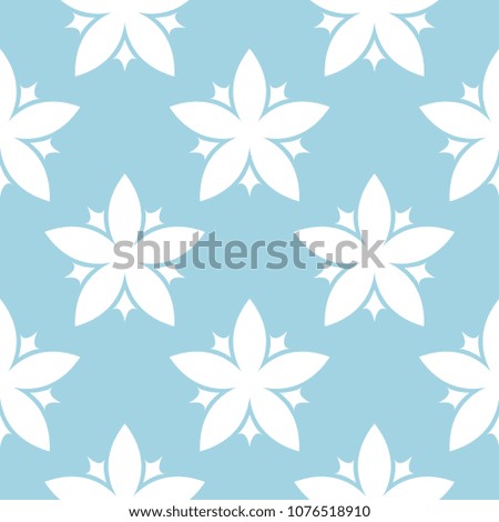 White floral ornament on blue background. Seamless pattern for textile and wallpapers