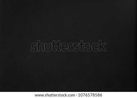 Blank dark black grainy wall background Royalty-Free Stock Photo #1076578586