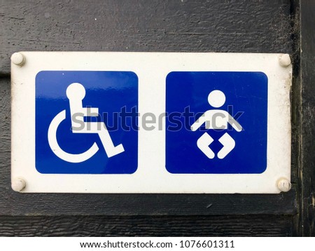 Public sign for disabled lavatory and baby changing facilities