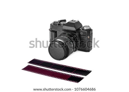 single-lens reflex camera and film, isolated on white background