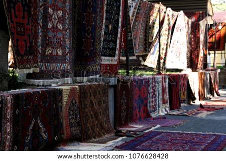 Armenian Traditional Carpets and Rugs
at the Vernissage Market in Yerevan, Armenia. Royalty-Free Stock Photo #1076628428