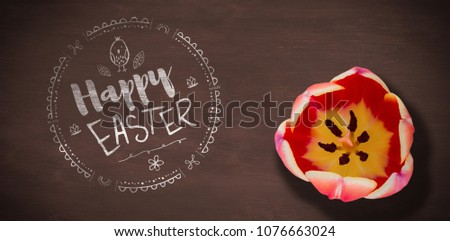Happy Easter white logo against a black background against brown blackground