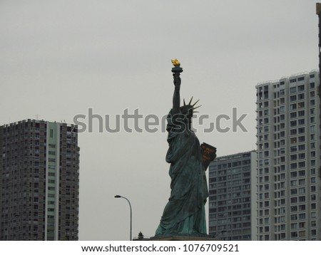 Photo of replica smaller of Statue of Liberty found in Paris, Grenelle bridge, France