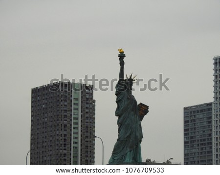 Photo of replica smaller of Statue of Liberty found in Paris, Grenelle bridge, France