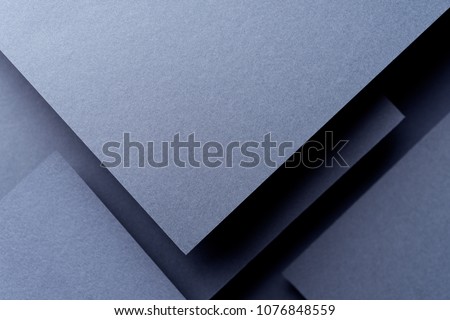 Dark abstract background inspired by material design using cardboard and paper