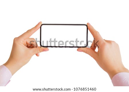 Person holding mobile phone with both hands. Mobile app mockup.