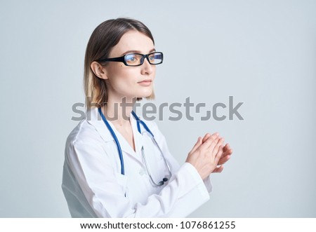 doctor with glasses and with a stethoscope                            