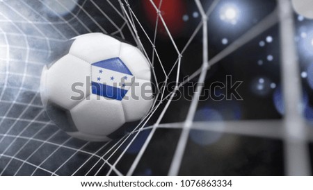 Very realistic rendering of a soccer ball with the flag of Honduras in the net.(3D rendering)