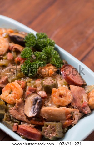 Louisiana Seafood Gumbo served over a bed of rice