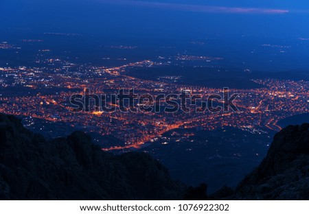 A look at the city at night. Top view
