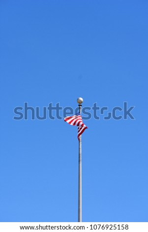 American Flag Against Blue Sky